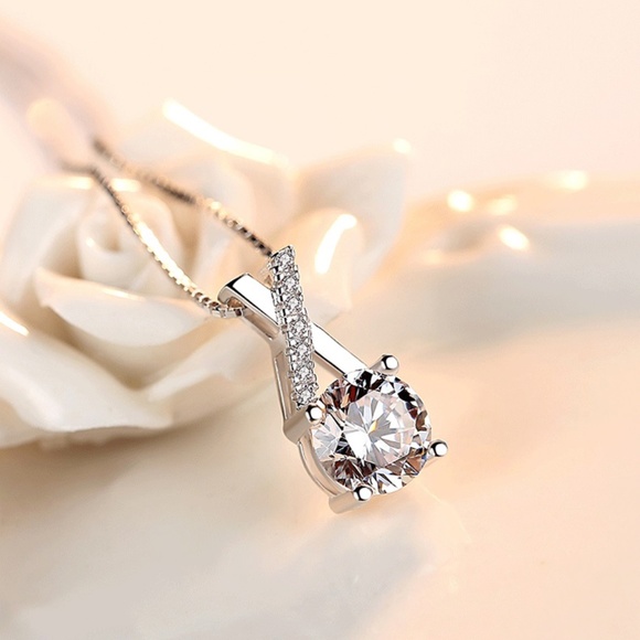 Sterling Silver Criss-Cross Stunning Simulated Diamond Silver Pendant Necklace - Picture 10 of 10